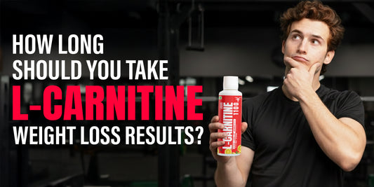 Man holding L-Carnitine bottle in gym thinking about weight loss results