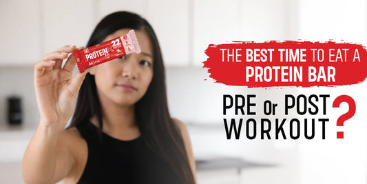 Person holding a protein bar showing pre-workout and post-workout nutrition timing